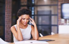 Shot of a businesswoman looking stressed while working at her deskhttp://195.154.178.81/DATA/i_collage/pu/shoots/806205.jpg